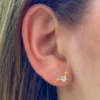 Aretes de Rodio Dorado con Diseño Estelar y Circonias Brillantes